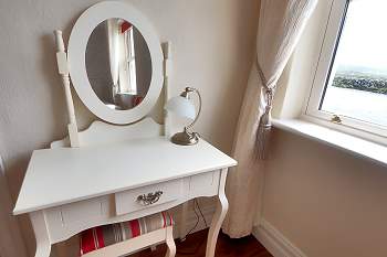 Dressing table with a mirror