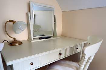 Dressing table with a mirror